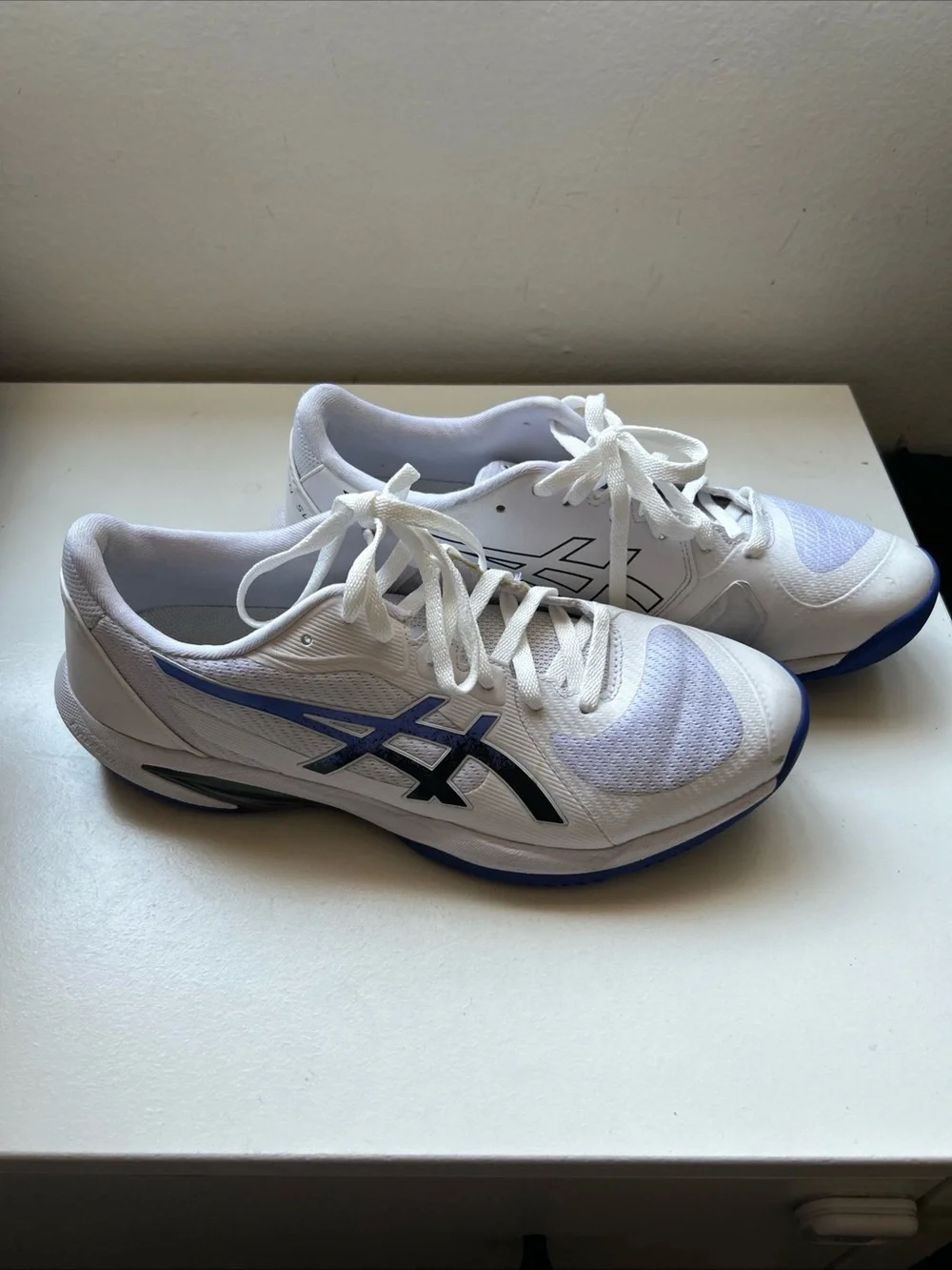 ASICS White Athletic Running Shoes with Blue and Black Accents